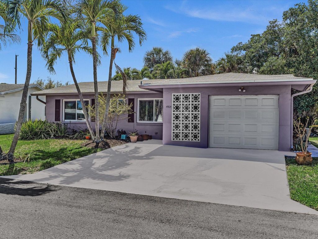 Photo of 4504 NW 47th Terrace, Tamarac, FL 33319 (MLS # B26002187)