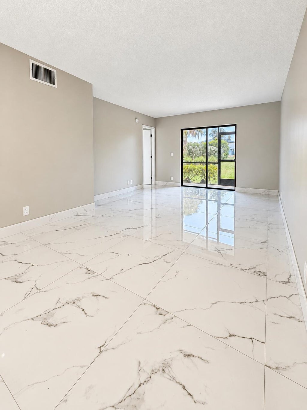 Photo of 7101 GOLF COLONY Court #101, Lake Worth, FL 33467 (MLS # B26078652)