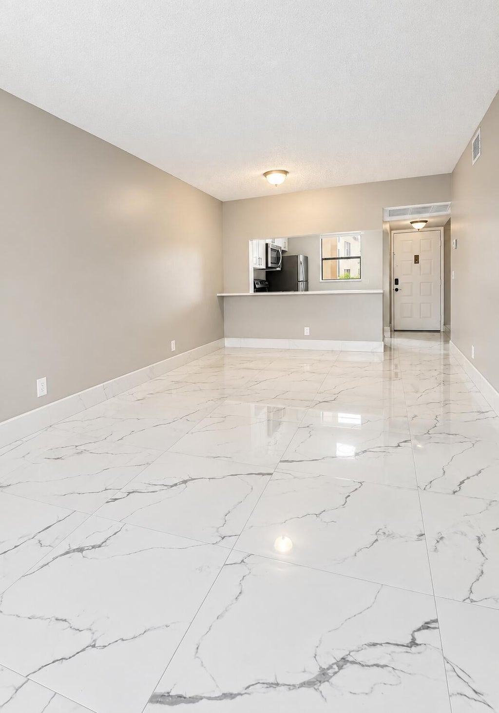 Photo of 7101 GOLF COLONY Court #101, Lake Worth, FL 33467 (MLS # B26078652)