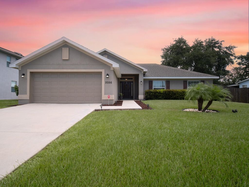 Photo of 2056 SW Americana Street, Port St Lucie, FL 34953 (MLS # R10905867)