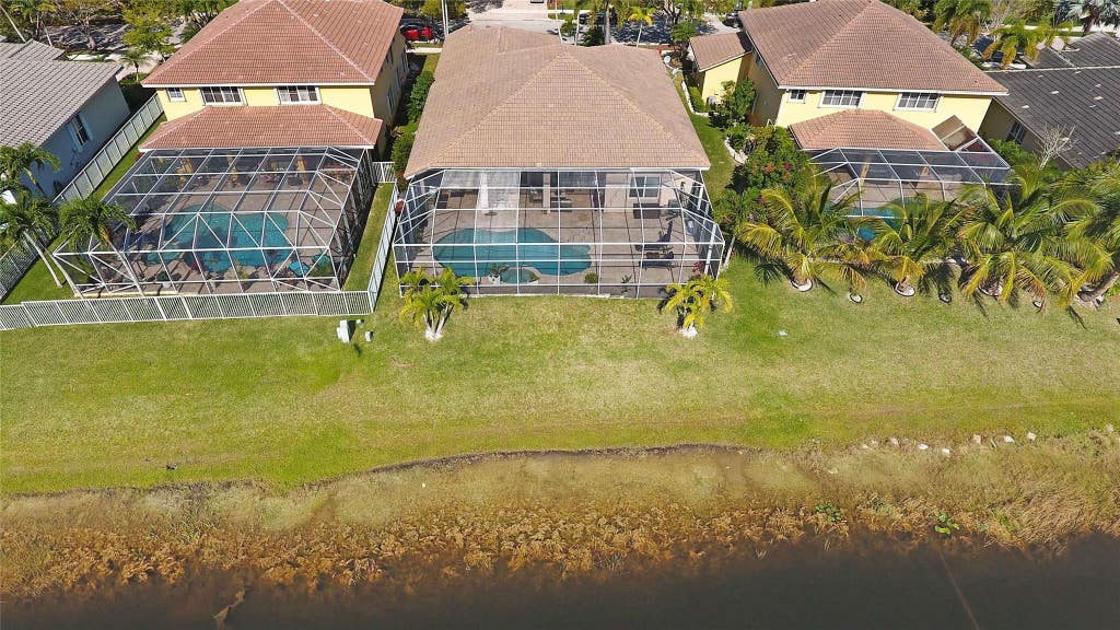 Photo of 1182 PEREGRINE Way, Weston, FL 33327 (MLS # B26060156)