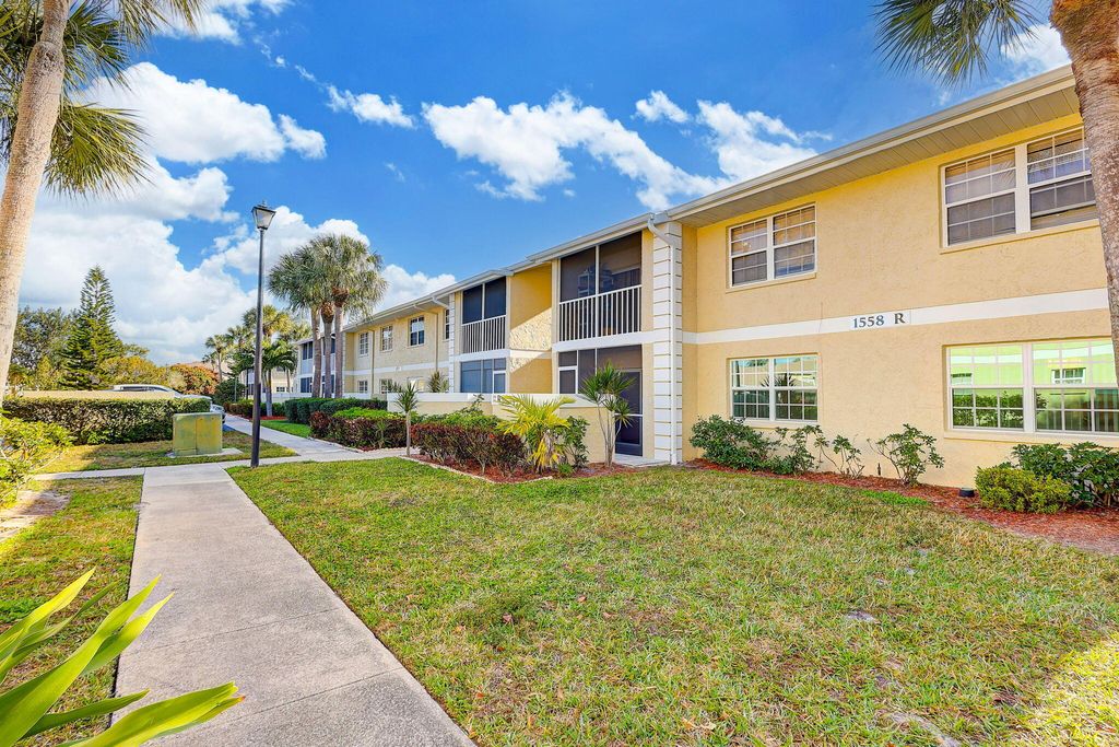 Photo of 1558 SE Royal Green Circle #101, Port Saint Lucie, FL 34952 (MLS # R11159887)