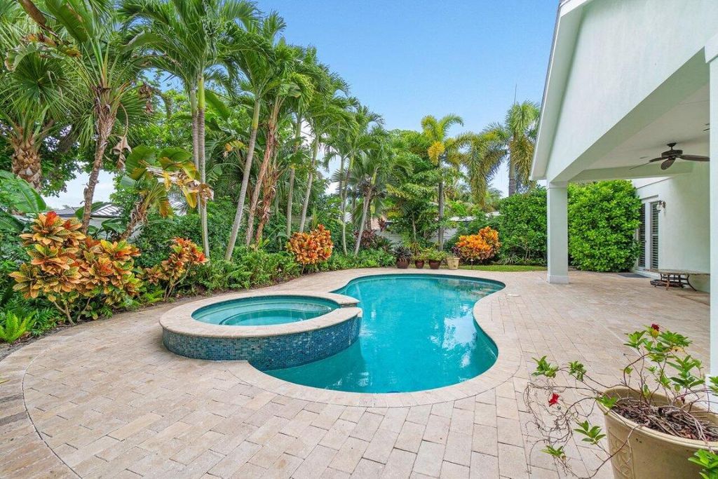 Photo of 126 Blossom Lane, Palm Beach Shores, FL 33404 (MLS # R10937411)