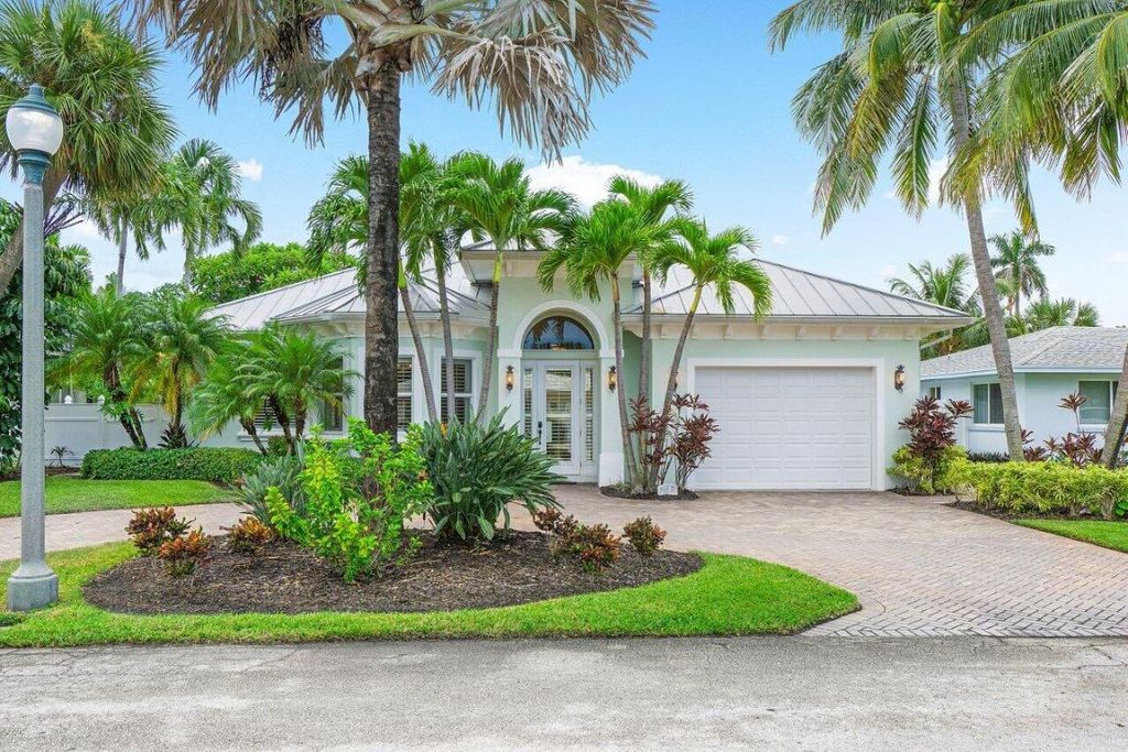 Photo of 126 Blossom Lane, Palm Beach Shores, FL 33404 (MLS # R10937411)