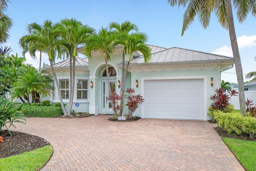 Photo of 126 Blossom Lane, Palm Beach Shores, FL 33404 (MLS # R10937411)