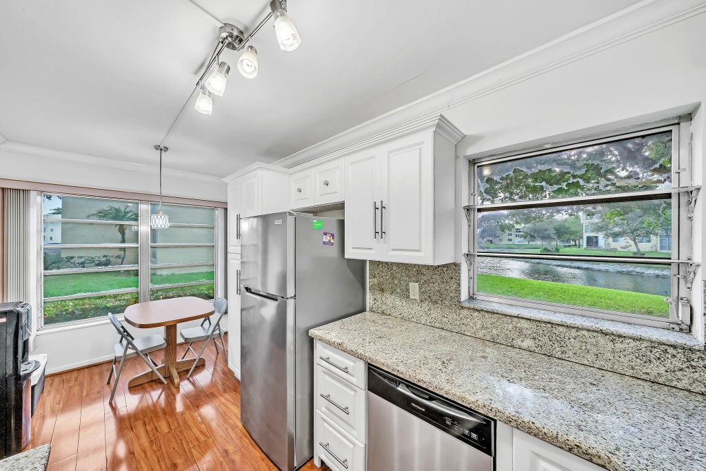 Photo of 5940 NW 64TH Avenue #101, Tamarac, FL 33319 (MLS # B26094412)