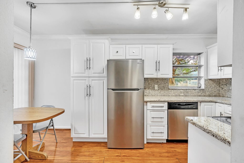 Photo of 5940 NW 64TH Avenue #101, Tamarac, FL 33319 (MLS # B26094412)