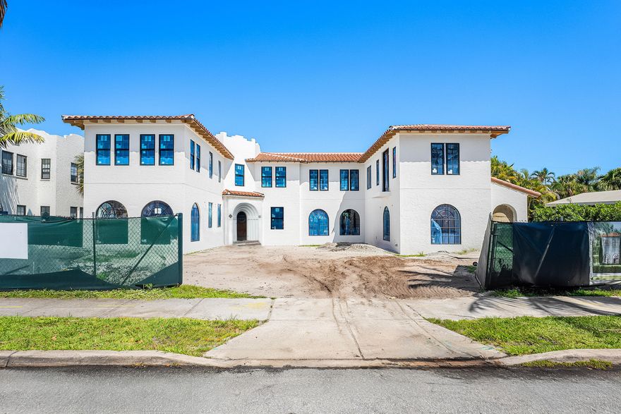 Historic-meets-new construction. Originally built in 1925, this residence has been taken down to the studs and is undergoing an expansive transformation nearly doubling in size to just under 5,000sf of luxurious living space in the main house with 5 BR & 4.1 BA, plus a 410 sf detached guest suite, and a pool cabana with a half bath and outdoor shower--a seamless blend of beloved and coveted historic charm and thoughtful modernity.  Imagined by CBG Developers, Gengler Architects, and SMR Consulting, 221 is set to be crafted with the finest materials and finishes.   **APPROVED FOR HISTORIC PROPERTY TAX EXEMPTION -- significant savings potential and value against neighboring non-historic new construction homes. Inquire for customization options. Greeted by a fountain-centered courtyard primed for cocktail gatherings, this Mediterranean property with bougainvillea framed entryways and picture windows is a showstopper in the neighborhood. The centerpiece of the backyard is a shimmering saltwater pool, pillared by four towering palm trees, creating a chic tropical oasis. The pool cabana is equipped with an outdoor shower, kitchen, bathroom and lounging area for effortless entertaining.   When hosting family or friends, the second-floor suite, with a kitchenette and washer/dryer, overlooking the grand backyard from its private balcony will serve as a retreat offering privacy and comfort.   Located steps away from the Intracoastal and the renowned Antique Row. You're minutes from downtown WPB, Palm Beach Island, and PBIA, along with the rapidly growing scene of top-tier shopping, entertainment, and dining, expanding from Northwood to SoSo - putting 221 Monroe right at the center of it all.   All renderings are conceptual and are subject to change without notice. All features, specifications, and plans are subject to change without notice. Not all amenities, features, finishes, and decorative objects depicted herein may be constructed or included in accordance with the artist's renderings or descriptions.