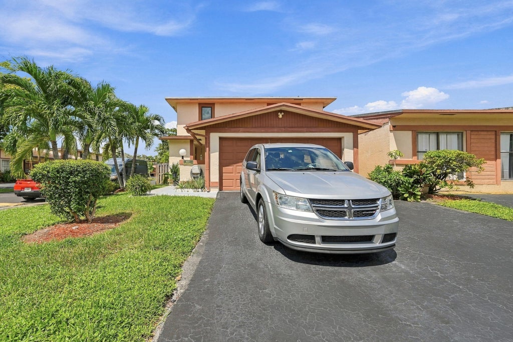 Photo of 6371 NW 29th Street, Sunrise, FL 33313 (MLS # B26077460)
