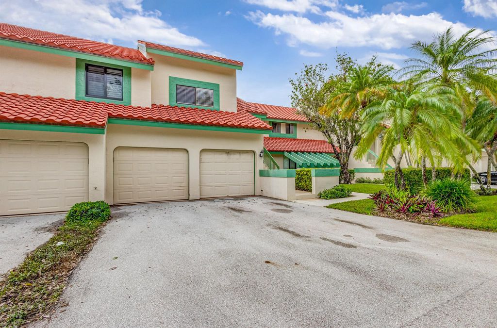 Photo of 13 Lexington Lane E #F, Palm Beach Gardens, FL 33418 (MLS # R11086226)