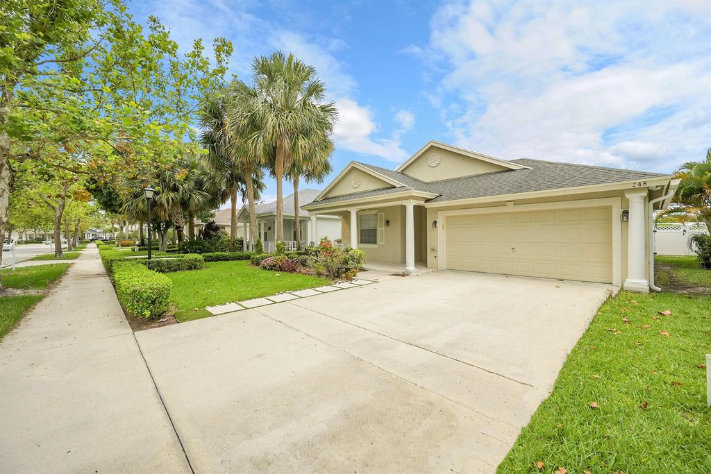 Photo of 248 Clocktower Drive, Jupiter, FL 33458 (MLS # R11096602)