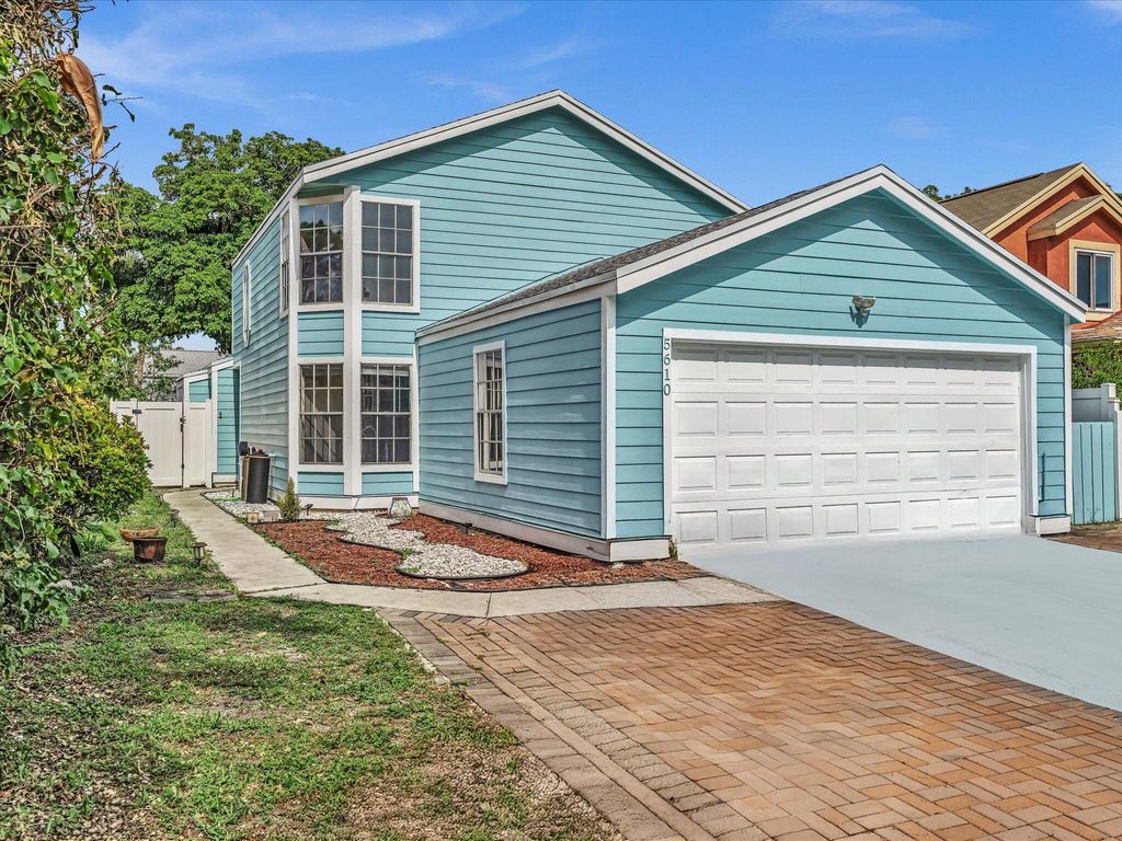 Photo of 5610 Dewberry Way, West Palm Beach, FL 33415 (MLS # B26028716)