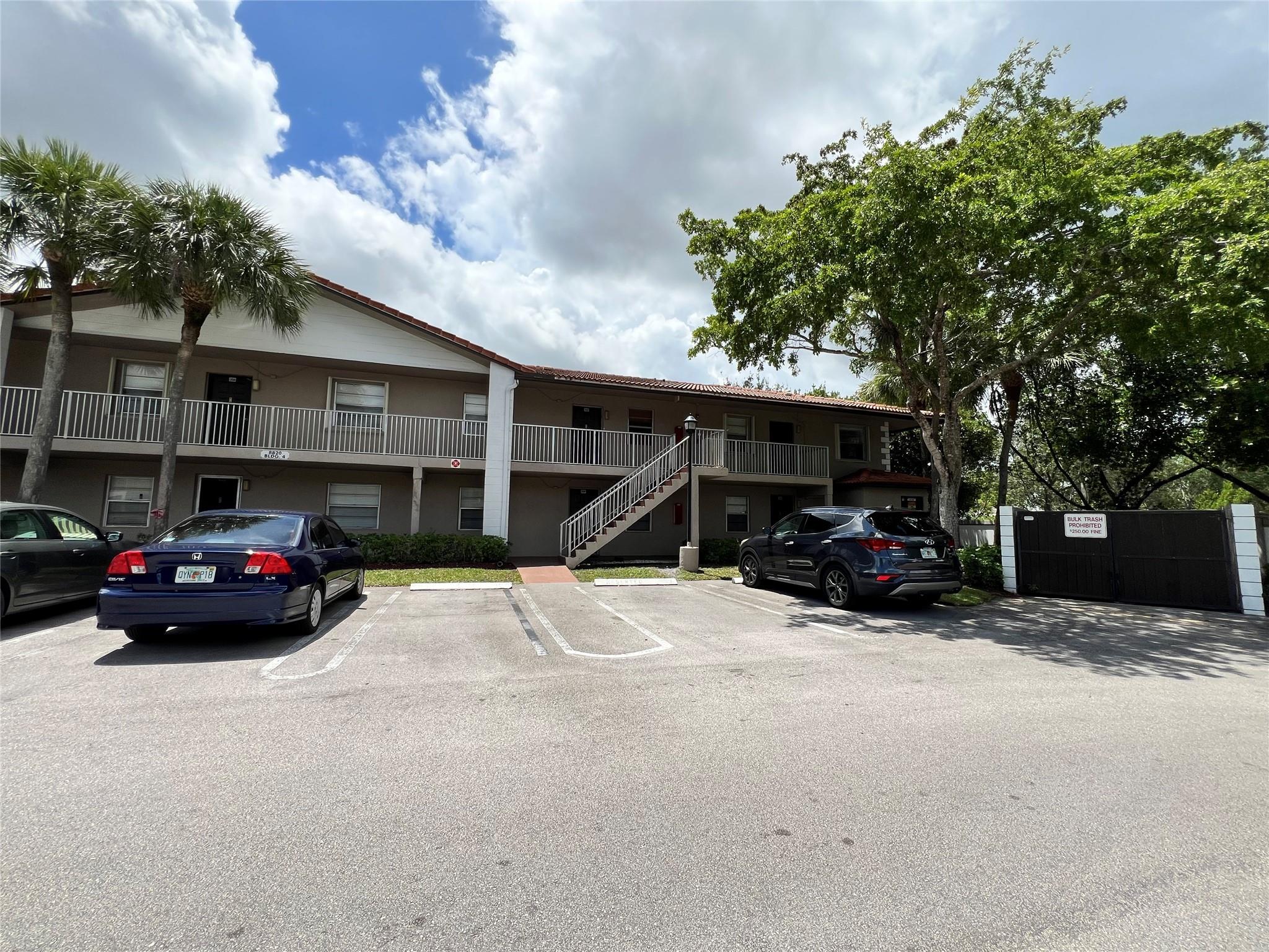 Clean and well maintained 2BD/2BA FIRST FLOOR CONDO in quiet community. Tile floors throughout open living area. Primary bedroom has luxury vinyl floor. Walk-in closets. Very nice kitchen and bathrooms. Full size washer and dryer. Screened in patio. Community swimming pool and gym. Centrally located in Coral Springs.