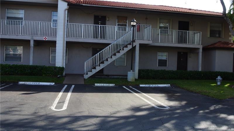 Clean and well maintained 2BD/2BA FIRST FLOOR CONDO in quiet community. Tile floors throughout open living area. Primary bedroom has luxury vinyl floor. Walk-in closets. Very nice kitchen and bathrooms. Full size washer and dryer. Screened in patio. Community swimming pool and gym. Centrally located in Coral Springs.