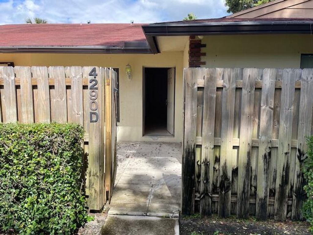 Photo of 4290 Woodstock Drive #D, West Palm Beach, FL 33409 (MLS # R11133068)
