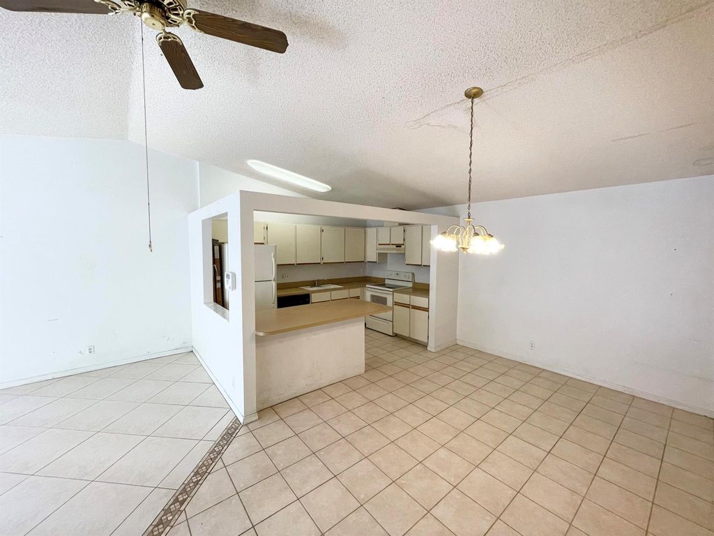 Photo of 4290 Woodstock Drive #D, West Palm Beach, FL 33409 (MLS # R11133068)