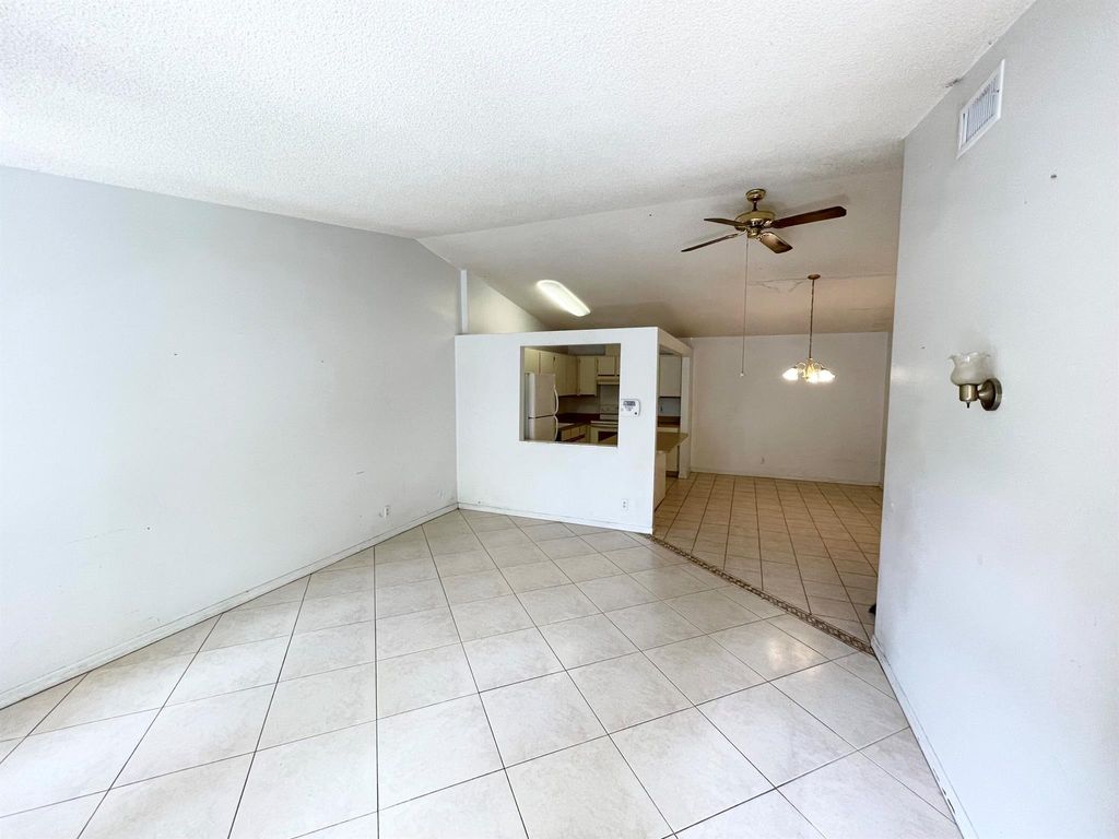 Photo of 4290 Woodstock Drive #D, West Palm Beach, FL 33409 (MLS # R11133068)