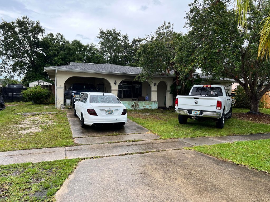 Photo of 323 NE Midfield Lane, Port Saint Lucie, FL 34983 (MLS # R10804865)