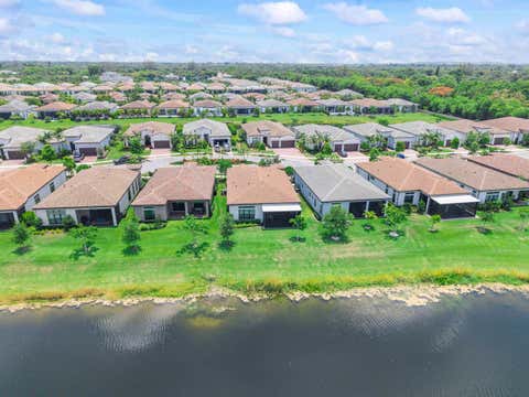 Tiny photo for 7885 Ironwood Way, Parkland, FL 33067 (MLS # B26049435)