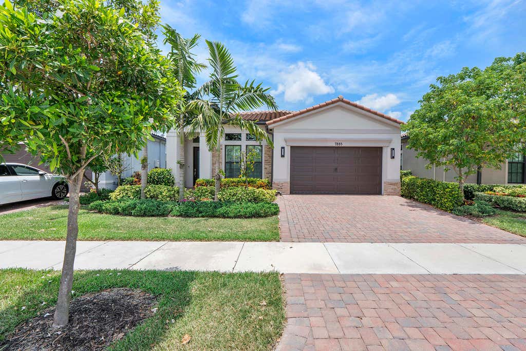 Photo of 7885 Ironwood Way, Parkland, FL 33067 (MLS # B26049435)