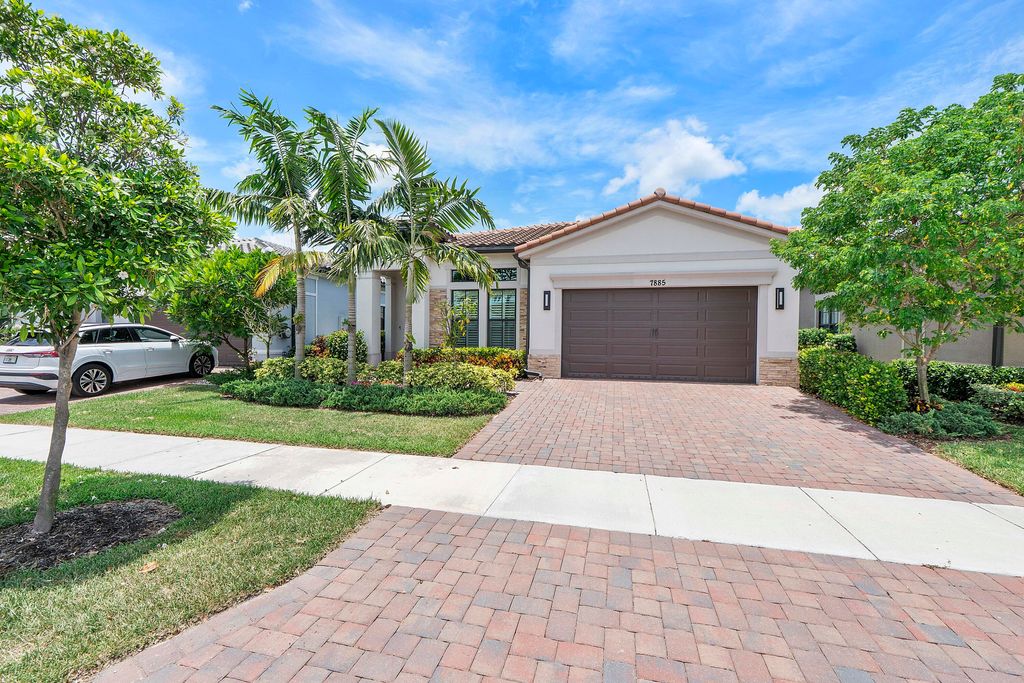 Photo of 7885 Ironwood Way, Parkland, FL 33067 (MLS # B26049435)