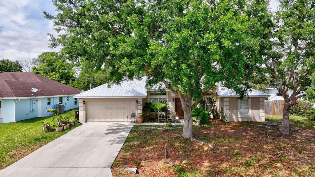 Photo of 1525 SW Falmouth Avenue, Port Saint Lucie, FL 34953 (MLS # B26012050)
