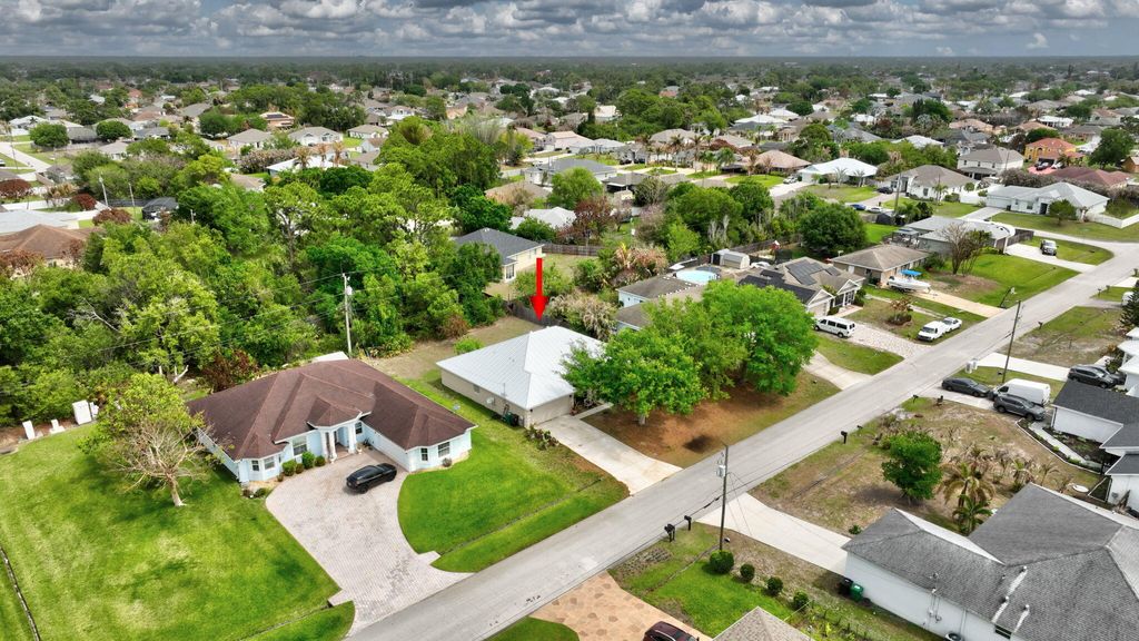 Photo of 1525 SW Falmouth Avenue, Port Saint Lucie, FL 34953 (MLS # B26012050)