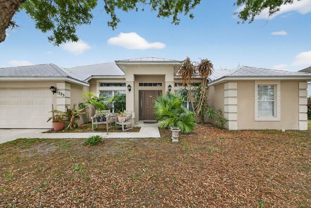 Photo of 1525 SW Falmouth Avenue, Port Saint Lucie, FL 34953 (MLS # B26012050)