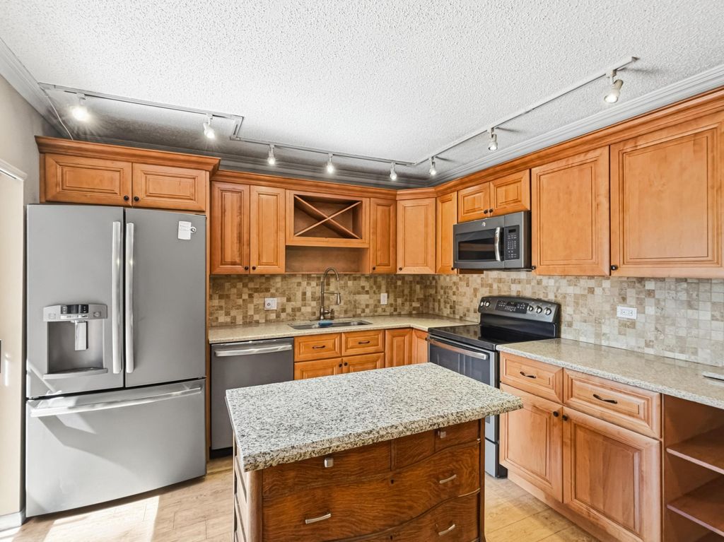 Photo of 1608 16th Terrace, Palm Beach Gardens, FL 33418 (MLS # B26032636)