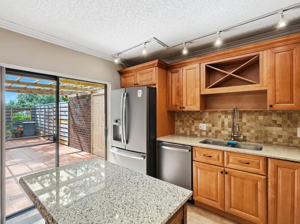 Photo of 1608 16th Terrace, Palm Beach Gardens, FL 33418 (MLS # B26032636)