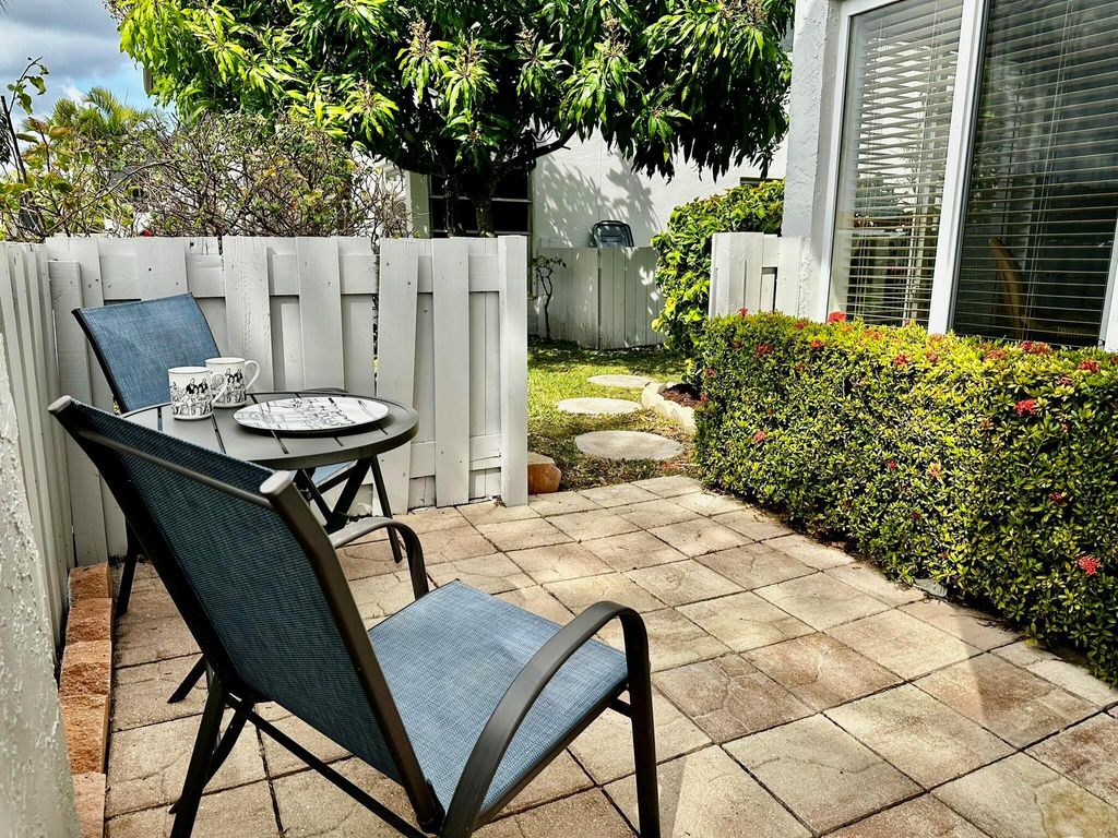 Photo of 5749 Phoenix Palm Ct #Unit A, Delray Beach, FL 33484 (MLS # R10964499)