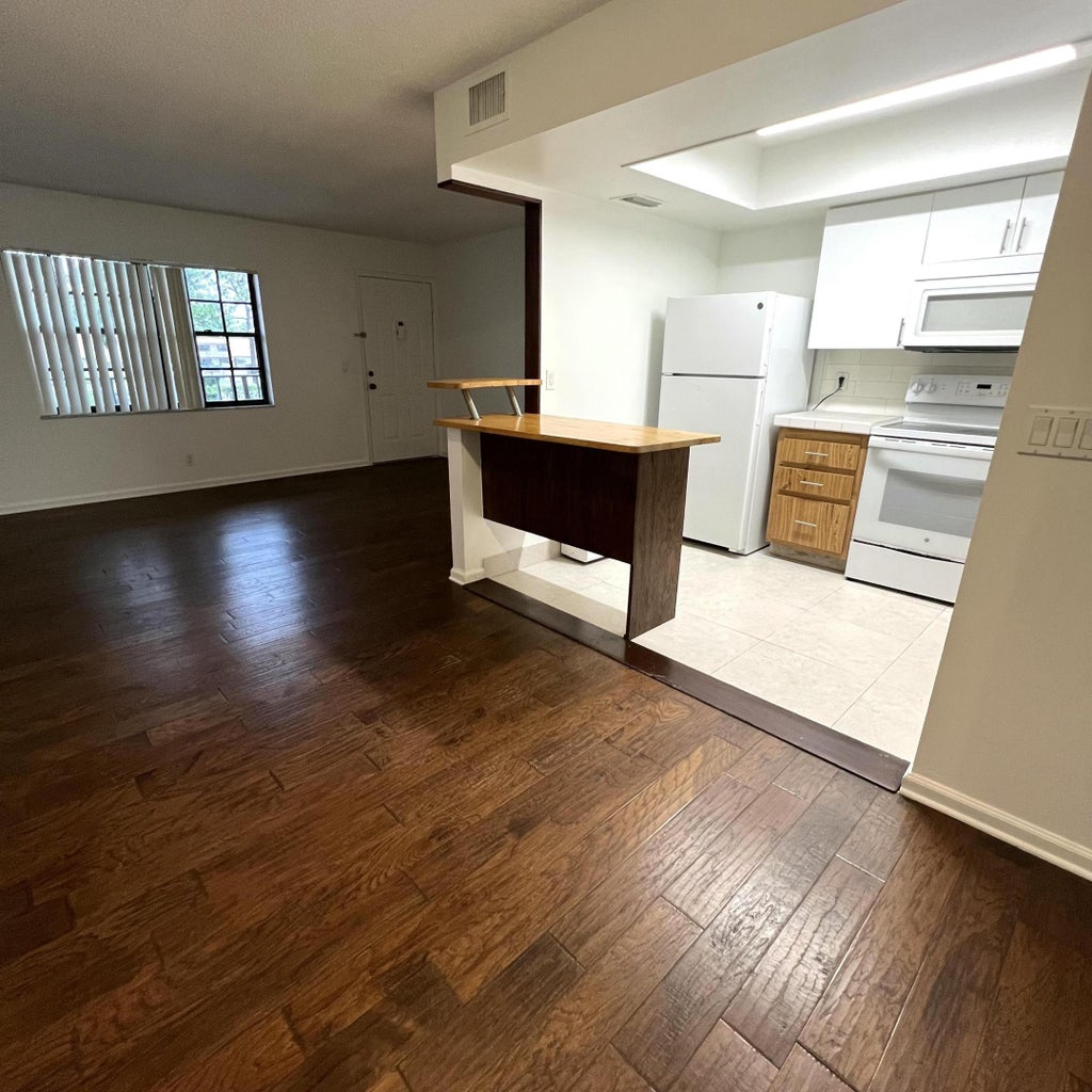 Photo of 4205 OAK TERRACE Drive, Greenacres, FL 33463 (MLS # B26074149)