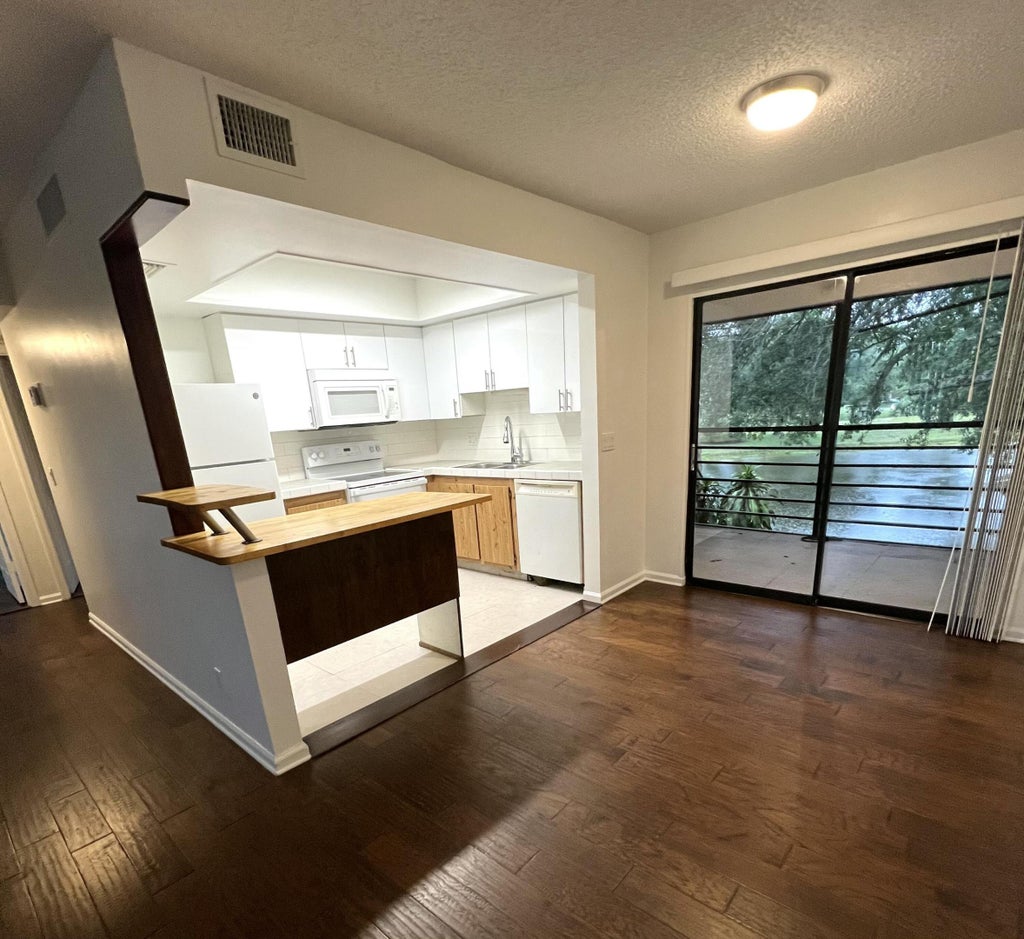 Photo of 4205 OAK TERRACE Drive, Greenacres, FL 33463 (MLS # B26074149)