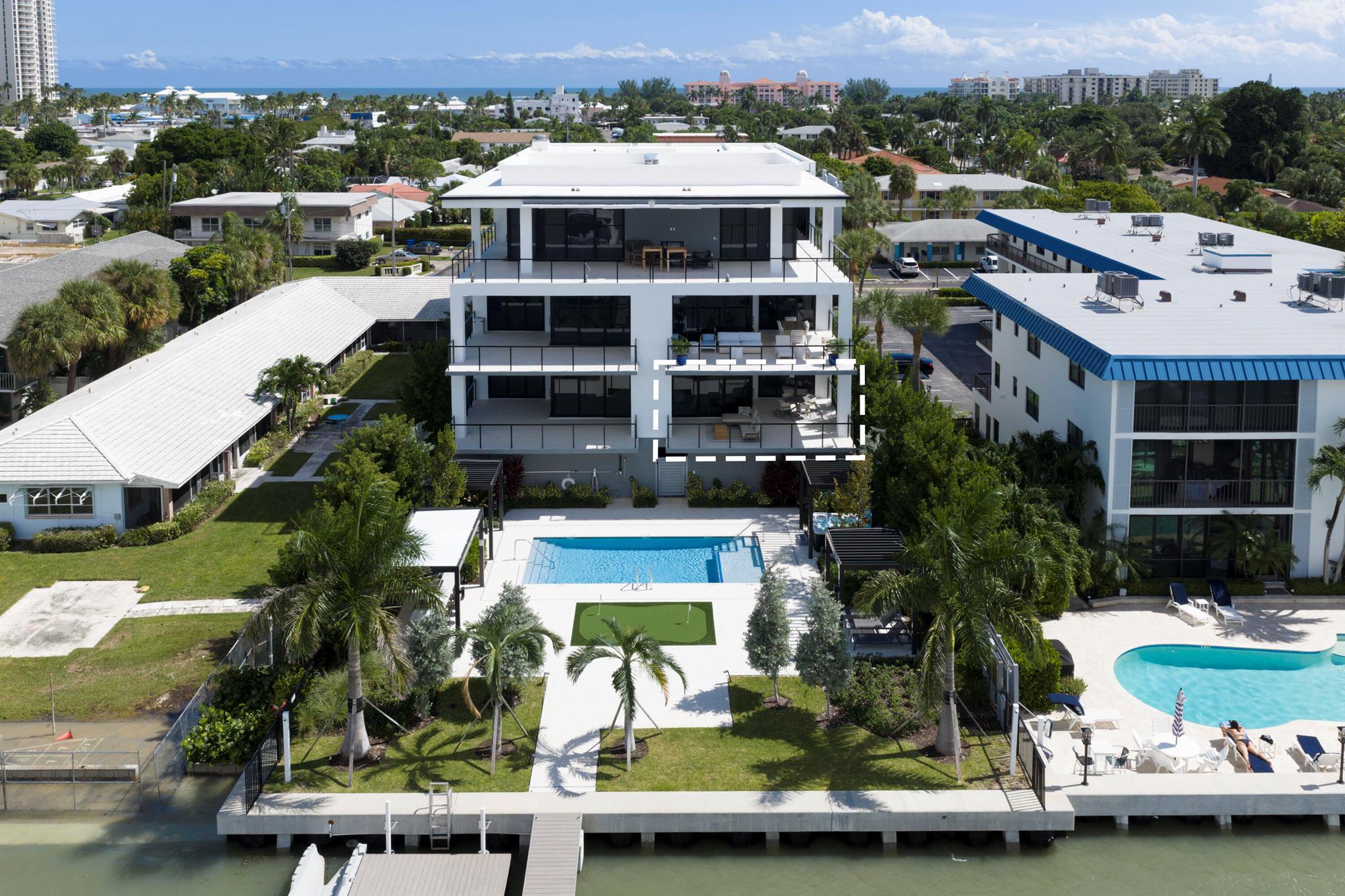Welcome to The Driftwood, a rare and refined sanctuary of just five ultra-luxury residences along the pristine Intracoastal waters of Singer Island. This brand-new 3-bedroom, 3.5-bathroom residence redefines waterfront living with unmatched construction integrity, security, and sophistication. Each bedroom features its own spa-inspired ensuite bath, while the spacious powder room adds convenience for guests. This is true lock-and-leave luxury, starting with your private, air-conditioned 2-car garage with epoxy floors and wired for a EV charger. Elevated seven feet above sea level and built atop 146 deep concrete pilings, The Driftwood is engineered for enduring strength, flood protection, and peace of mind. Its 12.8'' solid concrete floors, whisper mat underlay... (SEE SUPPLEMENT)