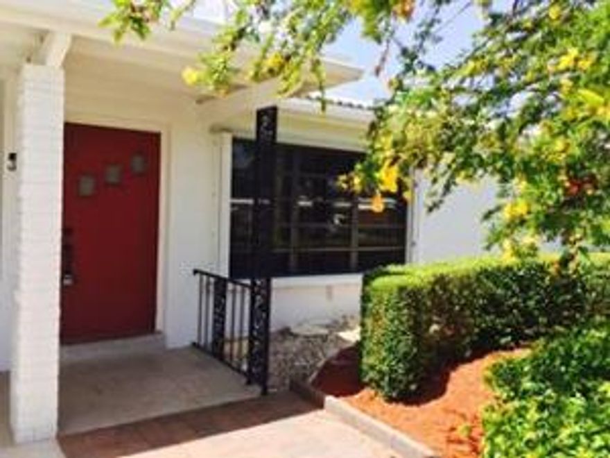 JUST TILED THROUGHOUT- GORGEOUS!GREAT EAST LOCATION!  BIKE TO THE BEACH- walkability plus!