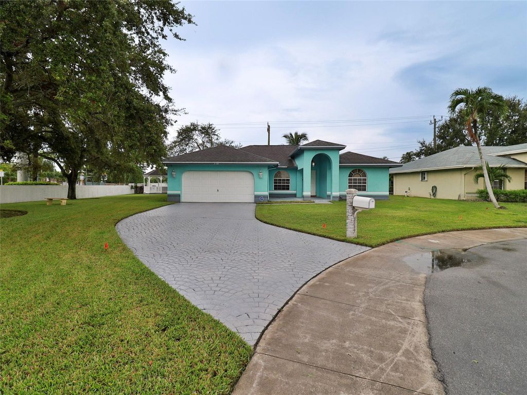 Photo of 3100 NW 43rd Place, Fort Lauderdale, FL 33309 (MLS # F10529687)