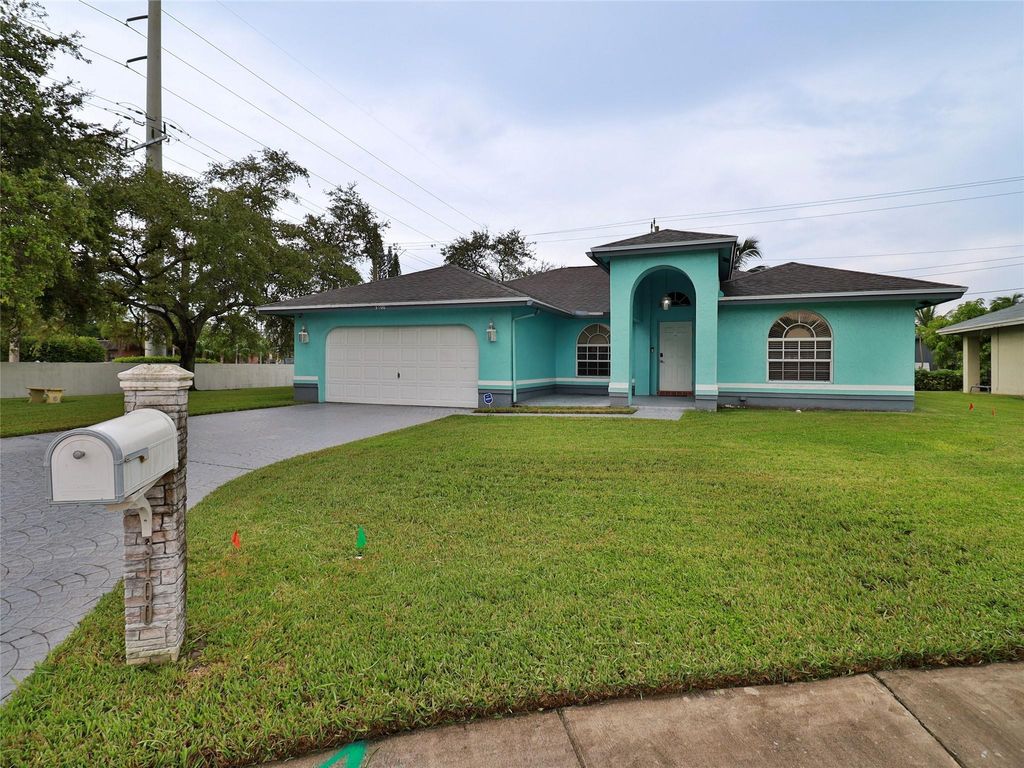 Photo of 3100 NW 43rd Place, Fort Lauderdale, FL 33309 (MLS # F10529687)