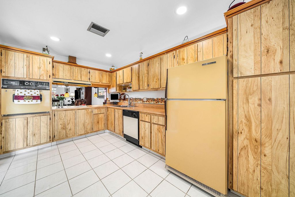 Photo of 5730 Fernley Drive E #23, West Palm Beach, FL 33415 (MLS # R11168412)