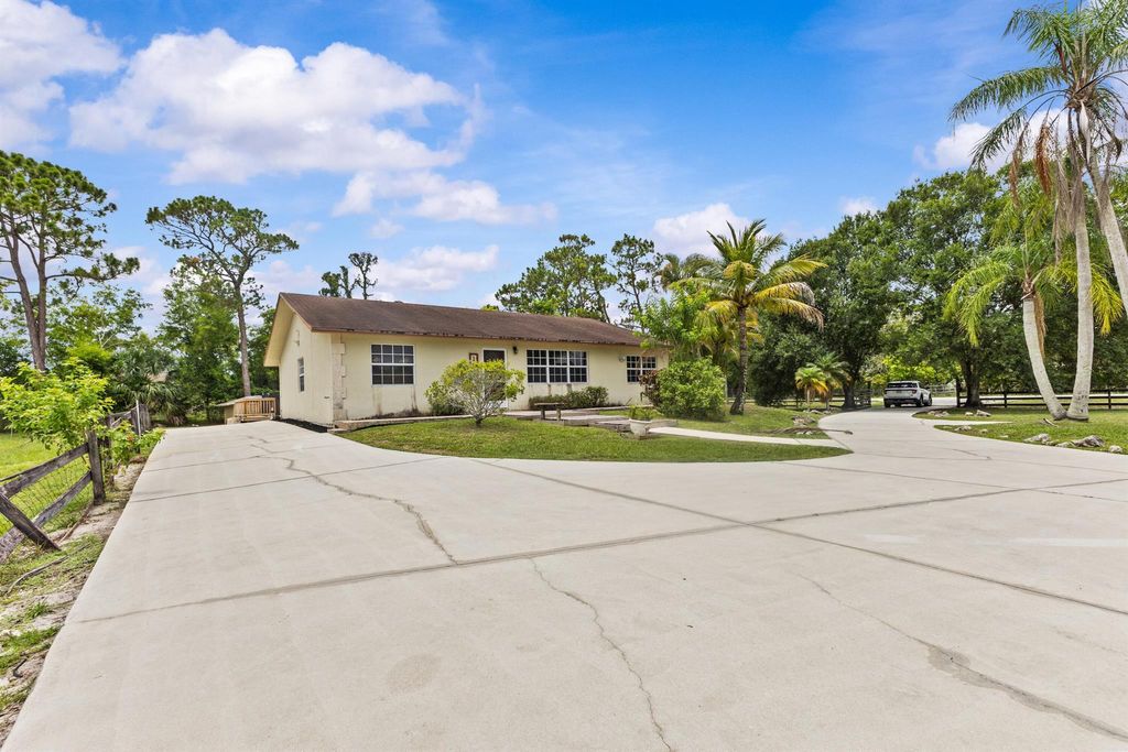 Photo of 13440 53rd Court N, The Acreage, FL 33411 (MLS # R11101970)