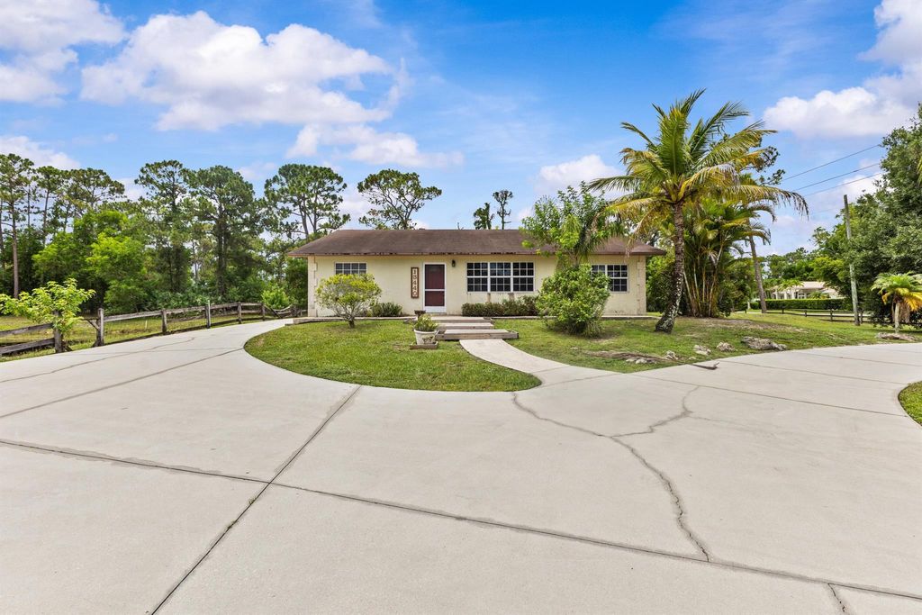 Photo of 13440 53rd Court N, The Acreage, FL 33411 (MLS # R11101970)