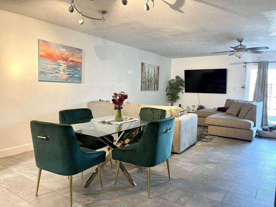 Fully furnished 3BR townhome- water and high speed internet included, flexible 3+ month lease. This beautiful home is approximately 7 miles from the beach and 15 minutes from downtown, offering convenient access to dining, shopping, and entertainment while maintaining a quiet residential setting. Interior features include stainless steel appliances, washer and dryer, and smart TVs in all rooms. The private patio is finished with low-maintenance turf and provides a functional outdoor space for everyday use or entertaining. Two assigned parking spaces are located directly in front of the unit. The property includes complimentary high-speed Wi-Fi and is offered fully furnished, making it move-in ready.