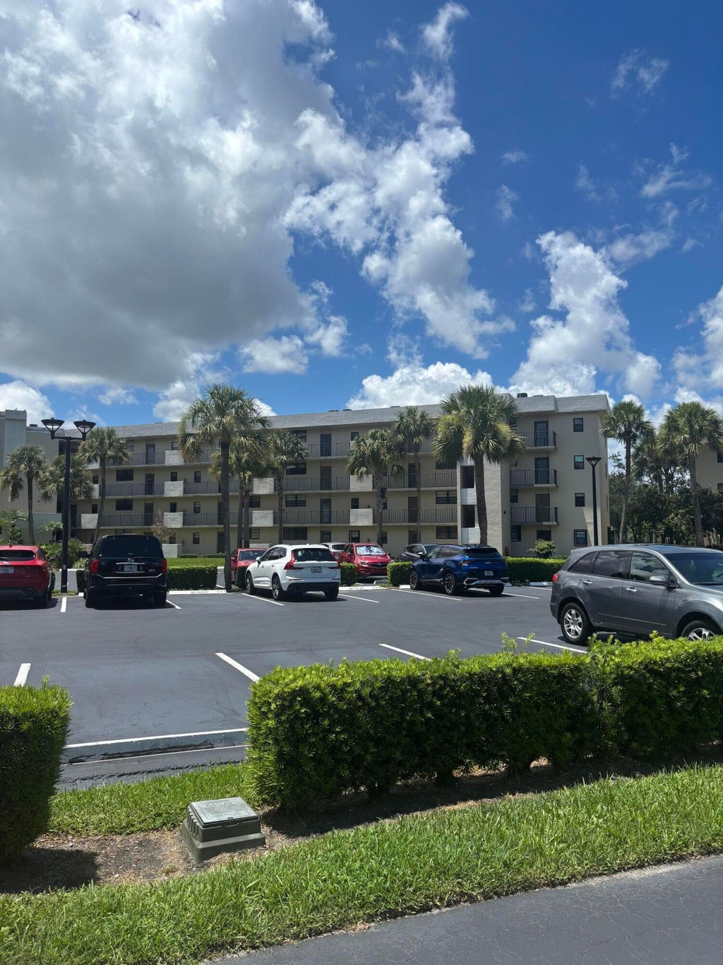 Photo of 2440 DEER CREEK COUNTRY CLUB Boulevard #202-C, Deerfield Beach, FL 33442 (MLS # B26086526)