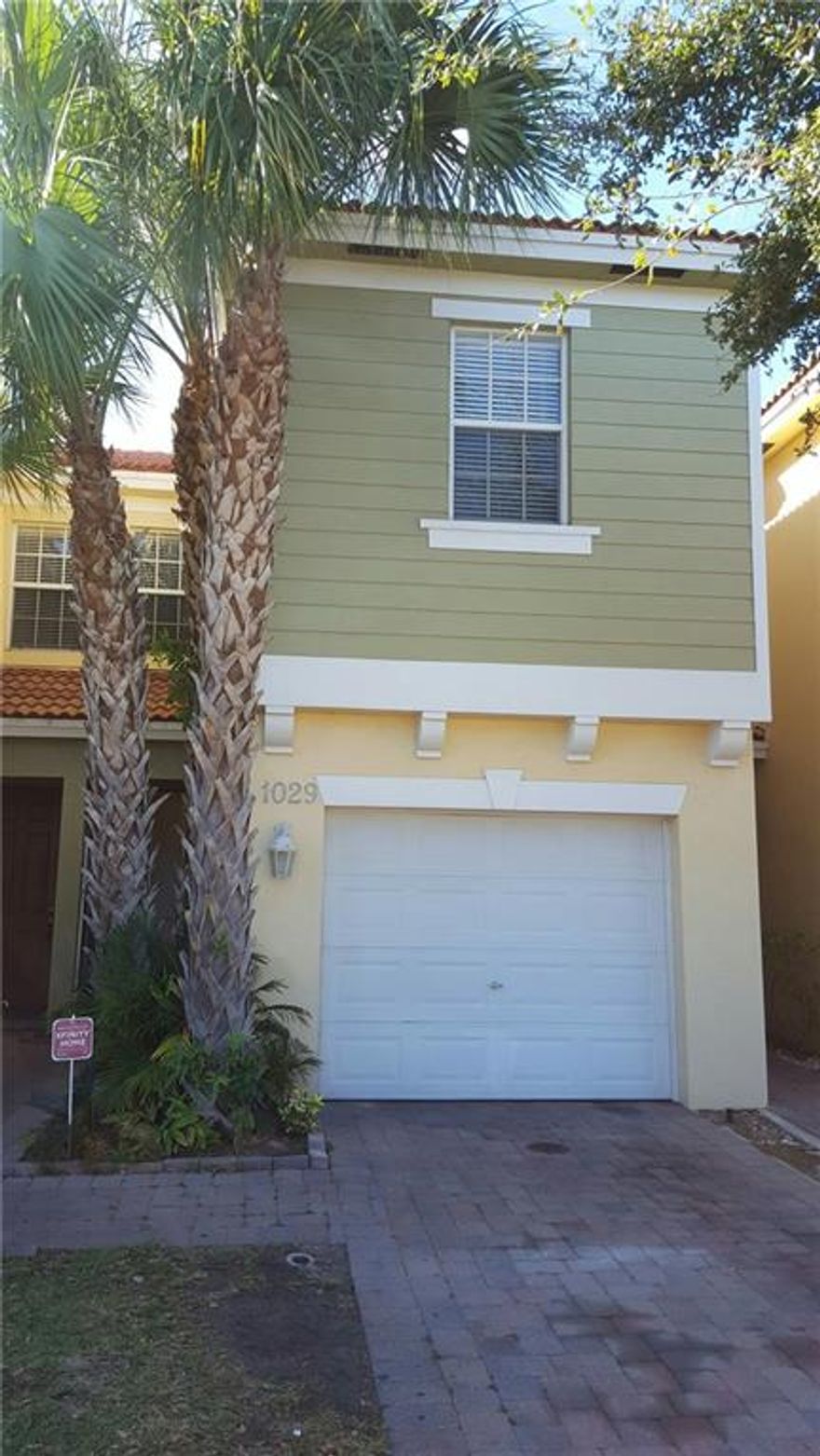 Fantastic condo-townhome that is ready to move in! Completely new kitchen cabinets, stainless steel appliances, granite countertops, new engineered wood flooring on second floor! Enjoy parking in your own garage! This town home is clean, bright and ready for its new owner!