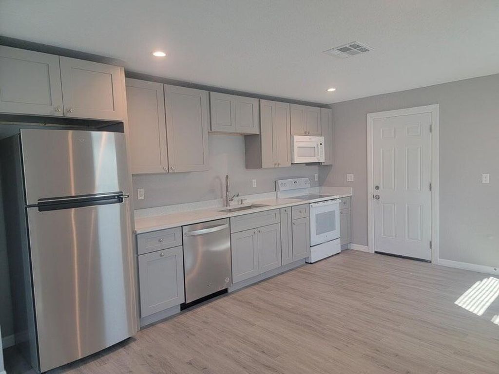 Photo of 1506 Avenue K, Fort Pierce, FL 34950 (MLS # R11047647)