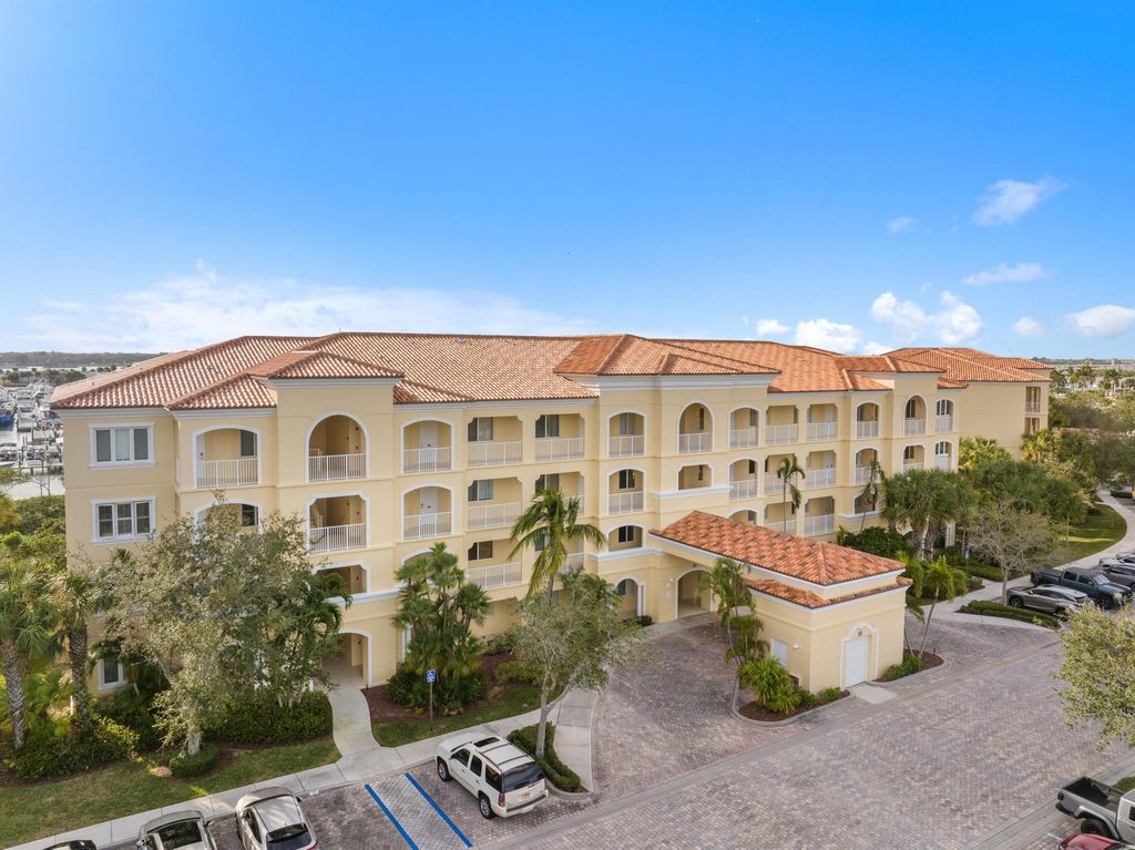 Photo of 33 Harbour Isles 201 Drive W #201, Fort Pierce, FL 34949 (MLS # R11088605)