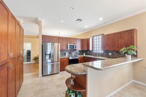 Tiny photo for 5877 NW 73RD Court, Parkland, FL 33067 (MLS # B26069155)