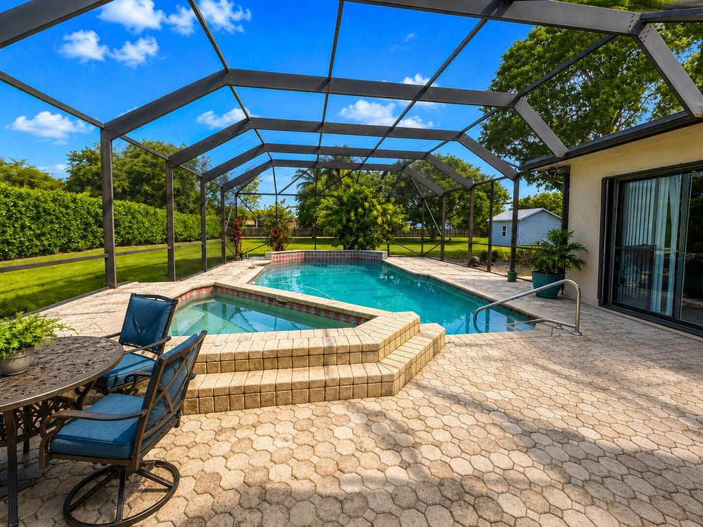 Photo of 11000 SW 59th Street, Davie, FL 33328 (MLS # B26040970)