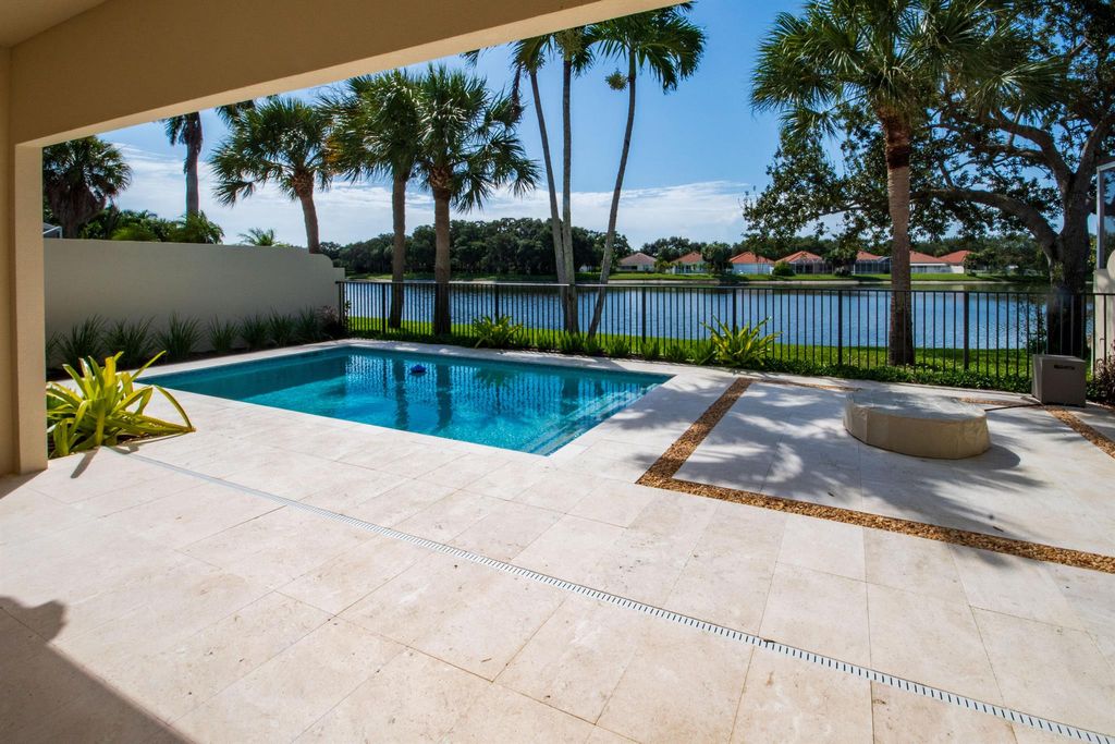 Photo of 105 Lost Bridge Drive, Palm Beach Gardens, FL 33410 (MLS # R11120688)