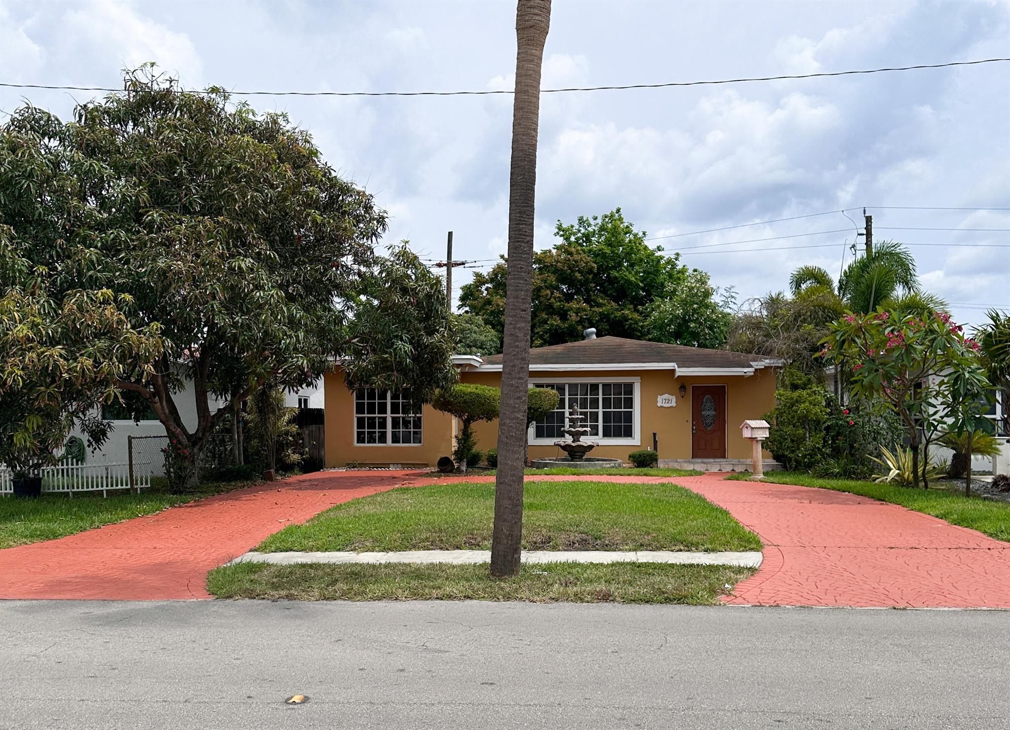 Welcome to sunny North Miami Beach. This home is ready for new owners. New updated kitchen with tons of counter and storage space. This home provides 3 Bedrooms, 2 Baths, dining room a Den and very large living room for the family to enjoy. New AC unit. The fenced in backyard provides a shaded garden. Room for a pool. Create your own paradise. Enjoy multiple mature fruit trees. Circular driveway for multiple parking. Schedule a showing today!