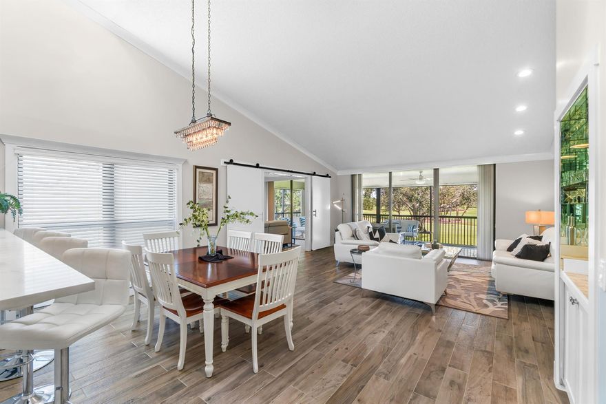 Welcome to this exceptional, fully renovated condo situated in the sought-after EASTGATE Subdivision of Hunters Run Country Club. With dramatic vaulted ceilings, skylights flooding the space with natural light, and an open-concept kitchen & great room; prepare to be captivated! This contemporary 3-bedroom, 2-bathroom gem has expansive golf course views and is located on the 2nd floor, with the convenience of an exterior elevator. The remodel includes an elegant, open kitchen, spa-inspired bathrooms, wood-plank ceramic tiled flooring, custom lighting, and 100% IMPACT GLASS THROUGHOUT. Furnished and turnkey, with newer contemporary furniture. Seize the opportunity to own this beautifully redone condo and relish these idyllic warm winter months at amenities-filled Hunters Run CC! Embrace the active lifestyle that comes with living at HUNTERS RUN COUNTRY CLUB; with top-notch amenities including 3 18-hole golf courses, tennis and pickleball courts, a resort-style pool, poolside bar, indoor & outdoor dining venues, a state-of-the-art gym w/ personal trainers & fitness classes, a spa & salon, and so much more! Just minutes away from the vibrant energy of Downtown Delray and the BEACH!